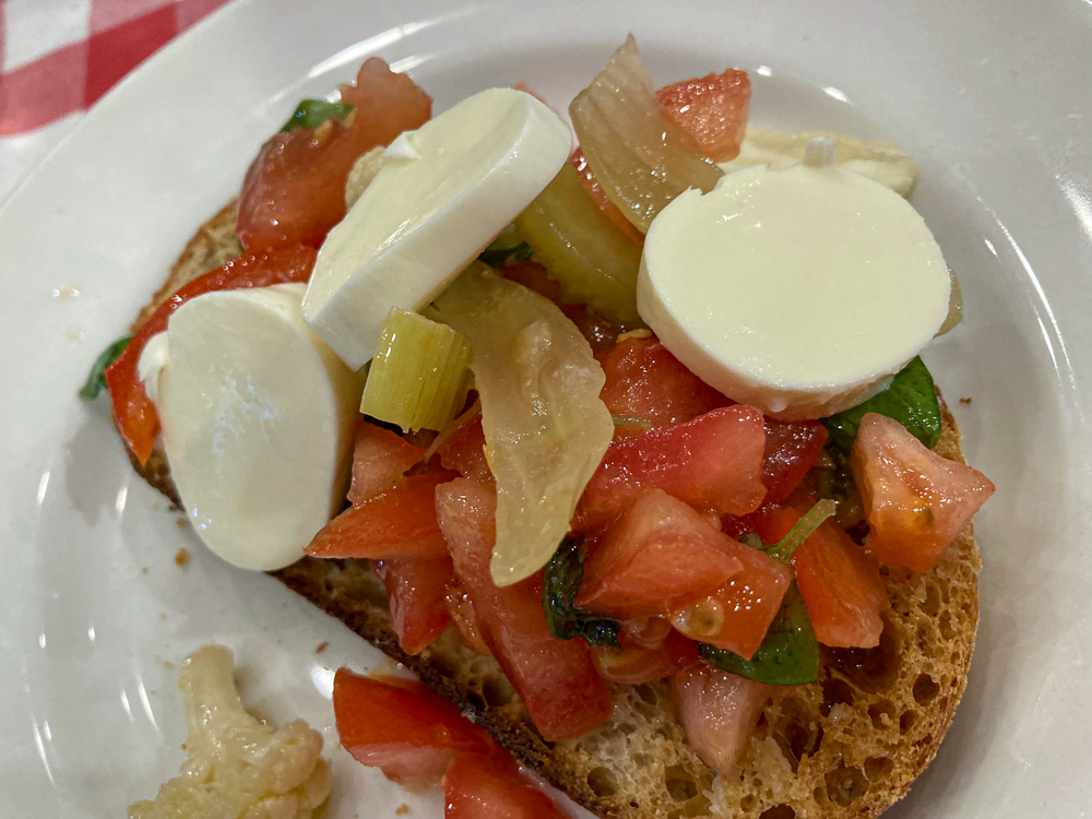 Bruschetta: tomatoes and bocconcini on bread