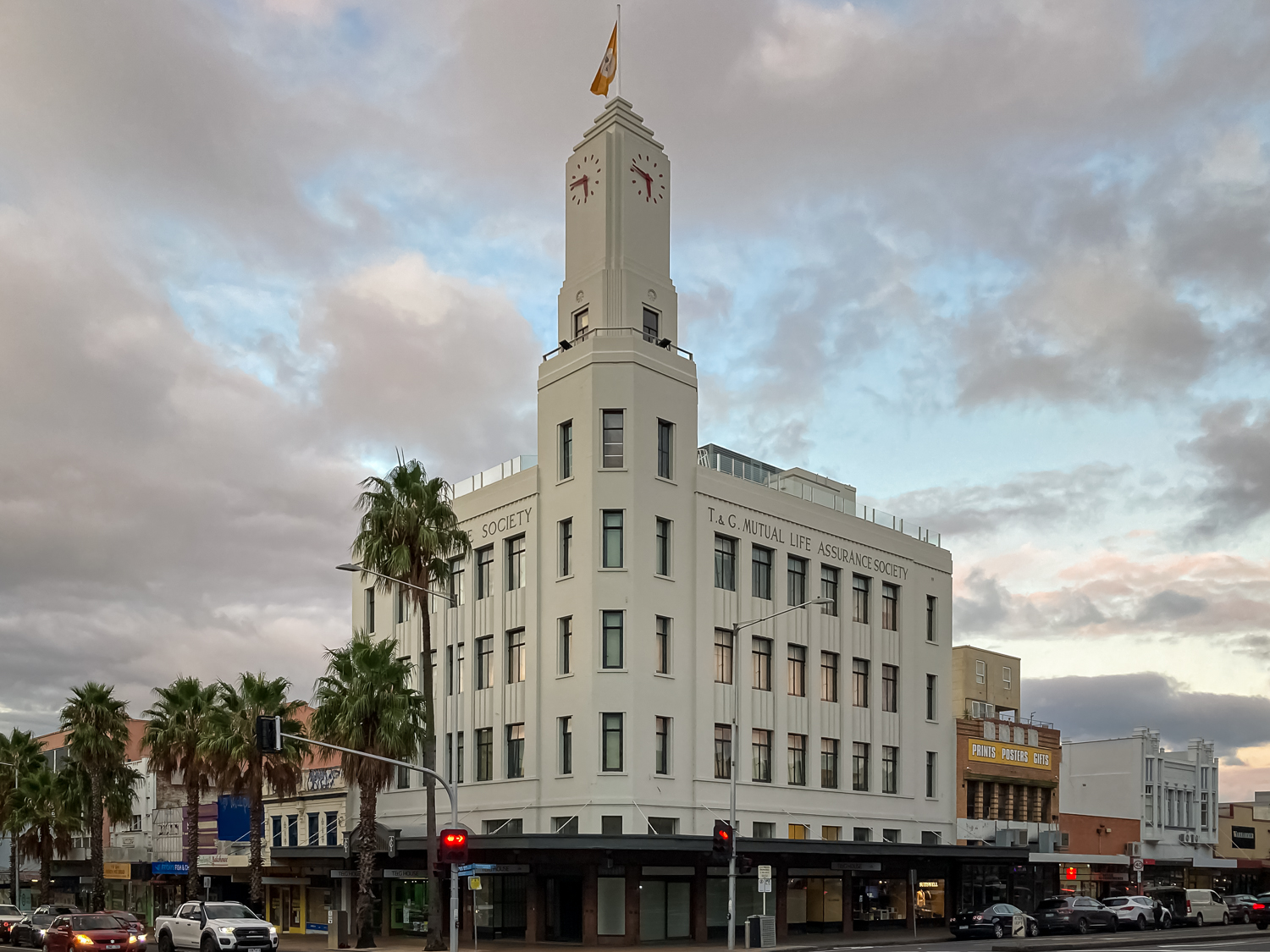 Geelong's T&G Building on a street corner at dusk